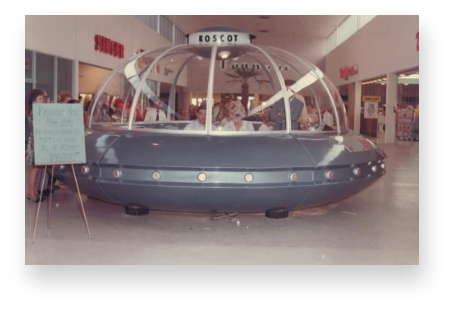 People dining in a UFO at the Melbourne Shopping Center in the 1950s