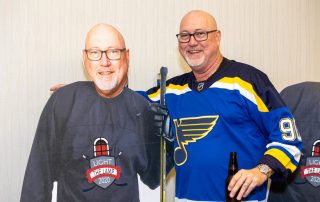 Neal Johnson, Board Chair Elect, wearing hockey jersey at the 2020 Impact Awards